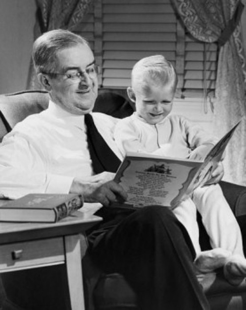 Grandfather reading story to grandson Poster Print - Item # VARSAL2553181