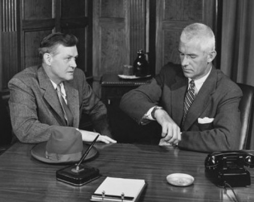 Two businessmen sitting together in an office Poster Print - Item # VARSAL25526030
