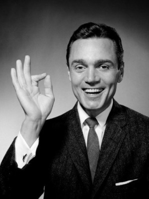 Studio portrait of businessman giving ok sign Poster Print - Item # VARSAL25511930B