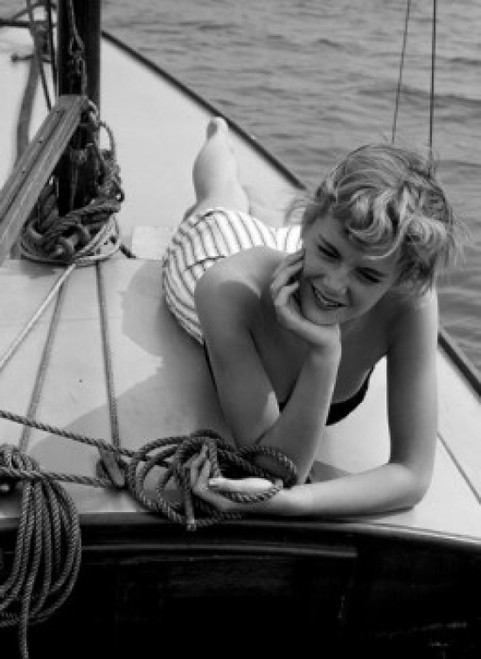 Woman relaxing on deck of boat Poster Print - Item # VARSAL25527174