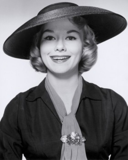 Studio portrait of young woman wearing hat  smiling Poster Print - Item # VARSAL25510325