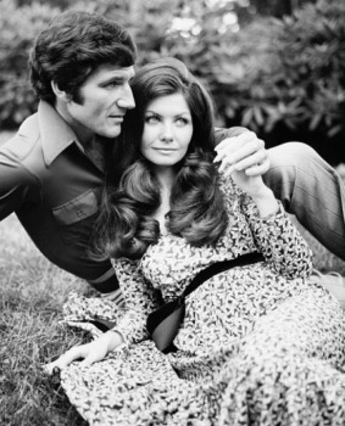 Young man with his arm around a young woman Poster Print - Item # VARSAL25516129