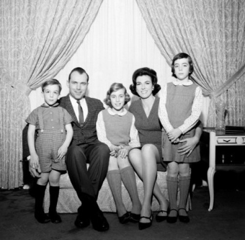 Portrait of family with children in living room Poster Print - Item # VARSAL255417644