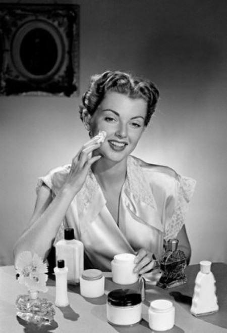 Woman applying face cream Poster Print - Item # VARSAL255418331