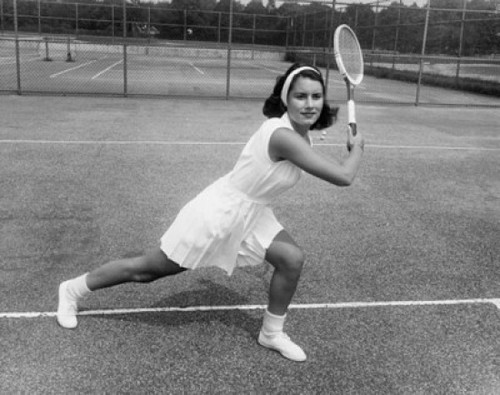Young woman playing tennis on a tennis court Poster Print - Item # VARSAL25524201B