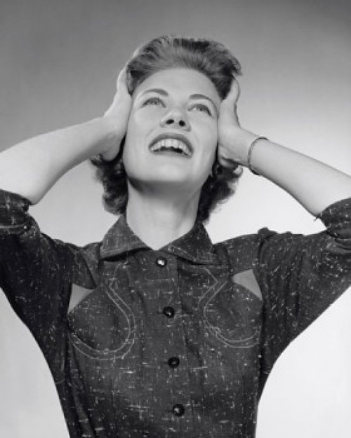 Close-up of a young woman holding her head Poster Print - Item # VARSAL25510582