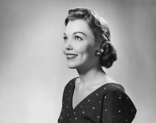 Side profile of a young woman smiling Poster Print - Item # VARSAL25510702