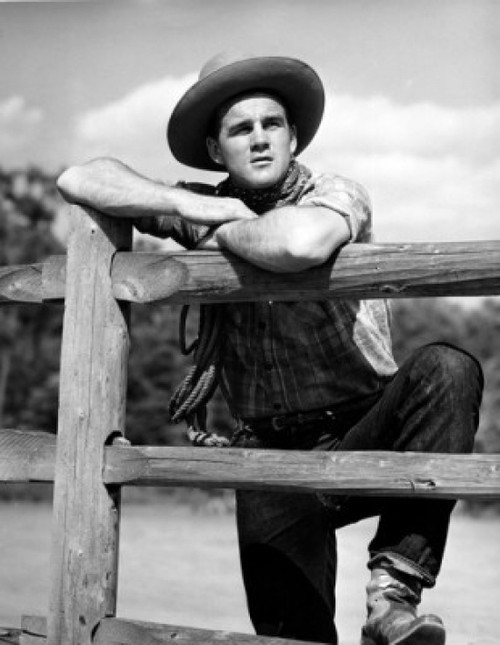 Cowboy leaning on fence Poster Print - Item # VARSAL2557586