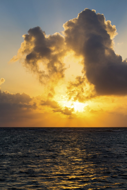 Dramatic colourful sky at sunrise reflecting off ocean with backlit clouds and blue sky; Akumal, Quintana Roo, Mexico PosterPrint - Item # VARDPI12269297