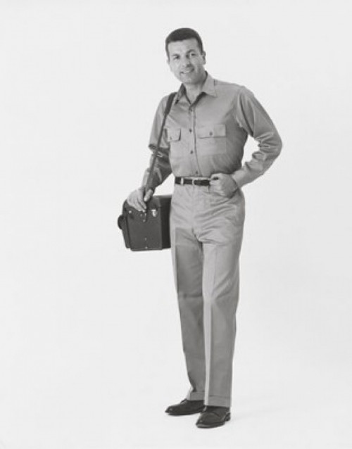 Man carrying a bag and smiling Poster Print - Item # VARSAL25536884