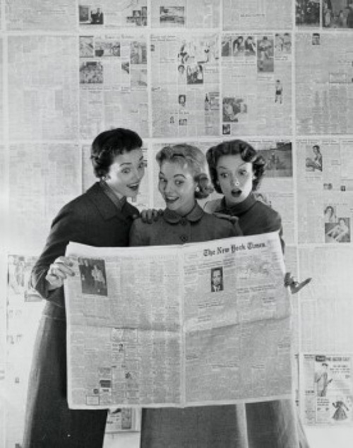 Three young women reading a newspaper Poster Print - Item # VARSAL25542610