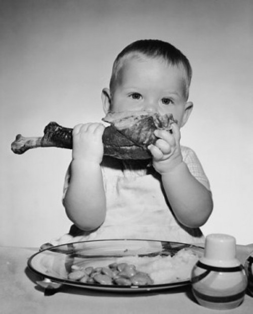 Baby eating turkey leg Poster Print - Item # VARSAL255663