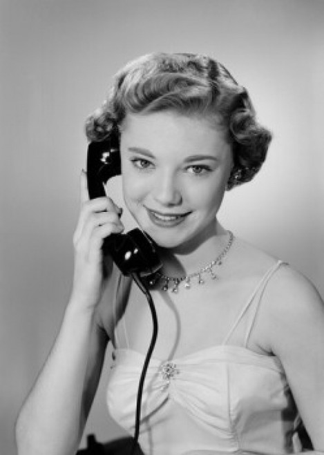 Portrait of young woman talking on phone Poster Print - Item # VARSAL255418986