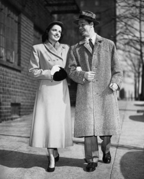 Young couple walking on a sidewalk Poster Print - Item # VARSAL2555053B