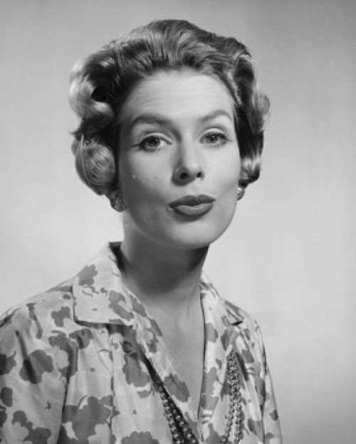 Portrait of a young woman puckering Poster Print - Item # VARSAL25511169A