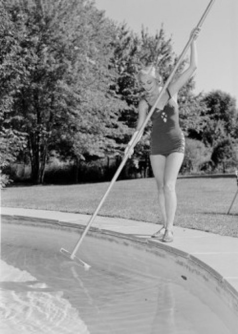 Young woman cleaning swimming pool Poster Print - Item # VARSAL255419032 Young woman cleaning swimming pool Poster Print - Item # VARSAL255419032