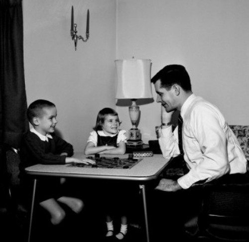 Father playing draughts with son and daughter Poster Print - Item # VARSAL255417749