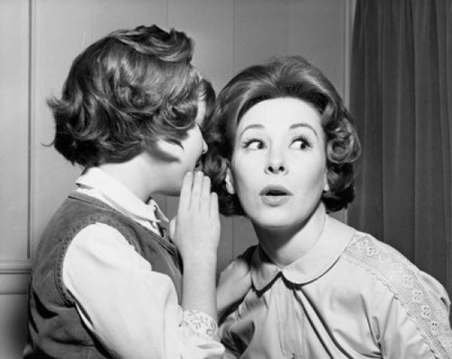 Side profile of a daughter whispering into her mother's ear Poster Print - Item # VARSAL2555996
