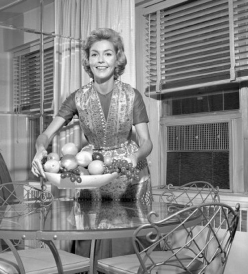 Mid adult woman holding bowl with fruits Poster Print - Item # VARSAL2555720A