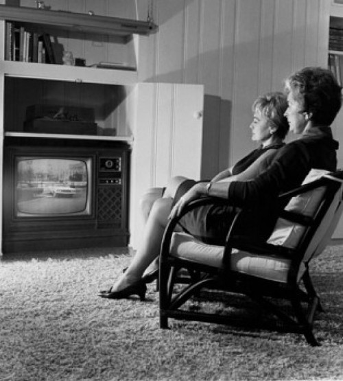Side profile of two mature women watching television Poster Print - Item # VARSAL25511267