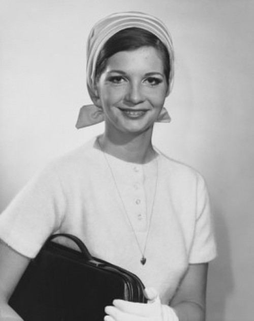 Portrait of a young woman holding a bag Poster Print - Item # VARSAL25541756