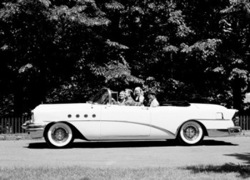 Side profile of parents and their two children traveling in a car Poster Print - Item # VARSAL2558939