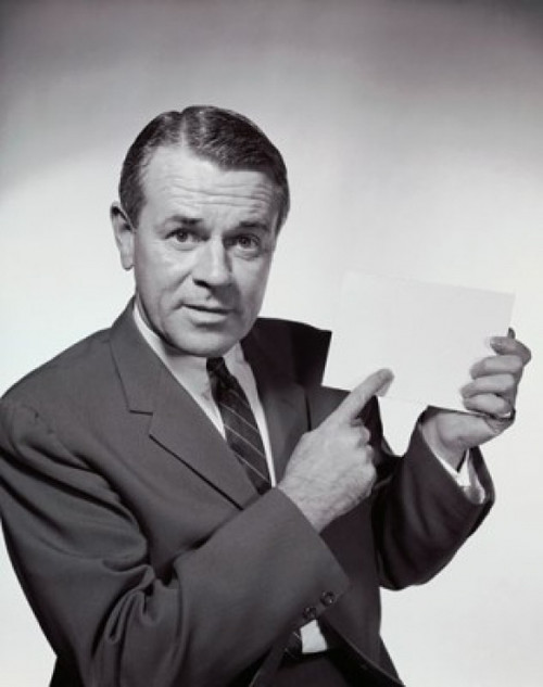 Businessman holding a blank placard Poster Print - Item # VARSAL25548700B