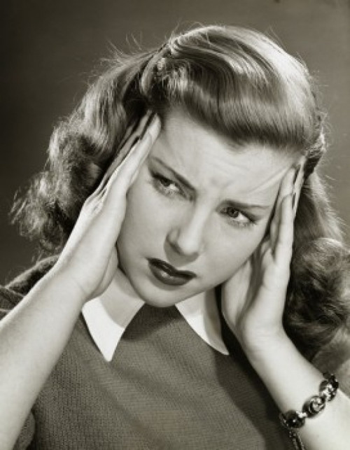 Close-up of a young woman holding her head Poster Print - Item # VARSAL2552897