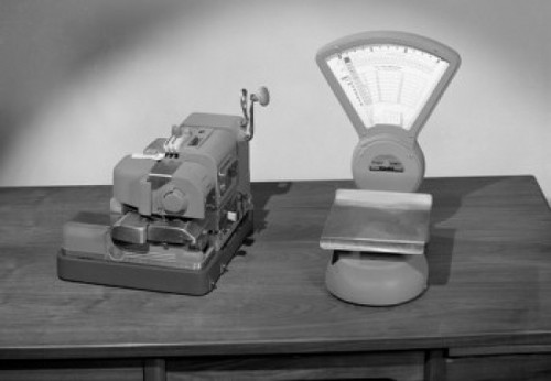 Mechanic device and weight scales on desk Poster Print - Item # VARSAL25548611