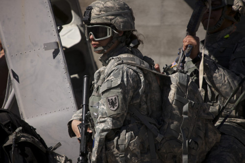Woman soldier conducts a combat training scenario at the Playas Training Area, New Mexico, during exercise Angel Thunder 2013. Poster Print - Item # VARPSTTMO101026M