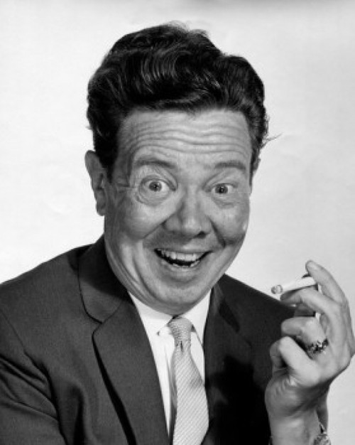 Portrait of a mid adult man holding a cigarette Poster Print - Item # VARSAL2556694