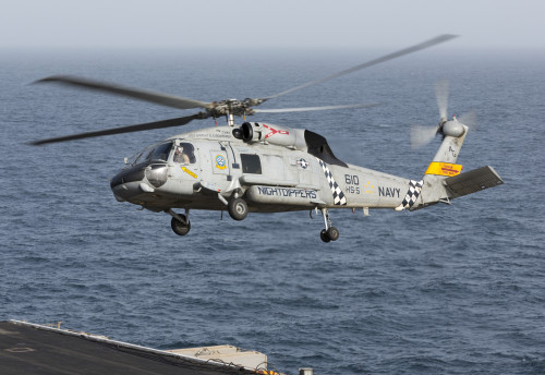A Sh 60j Seahawk Flys By Uss Vicksburg During A Vertical Replenishment Poster Print Item Varpstgkrm Posterazzi