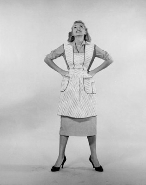 Studio shot of young woman standing with arms akimbo Poster Print - Item # VARSAL25542077