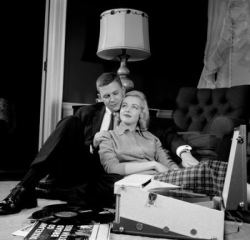 Young couple listening to records at home Poster Print - Item # VARSAL255417027