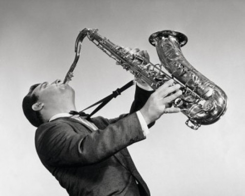 Mid adult man playing the saxophone Poster Print - Item # VARSAL25518662