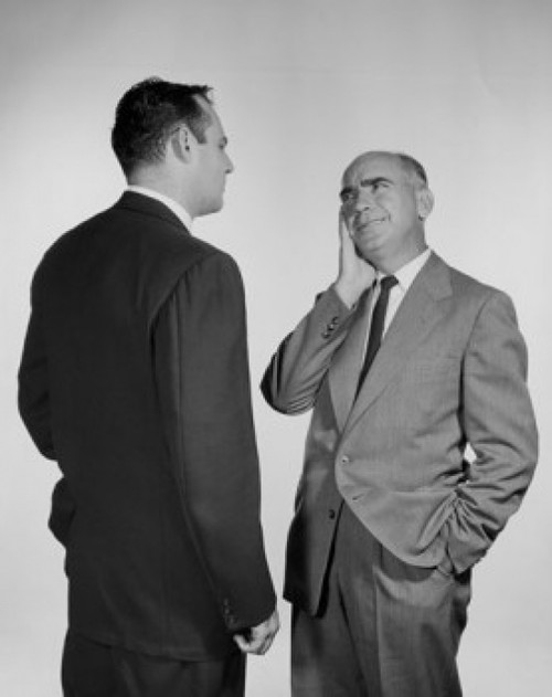 Two businessmen talking Poster Print
