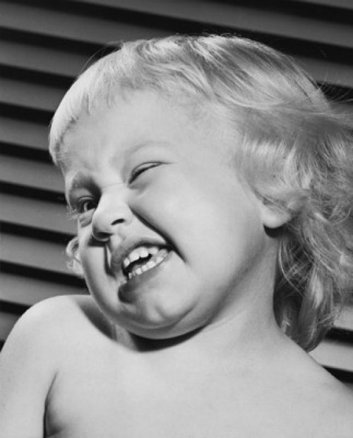 Close-up of a baby winking Poster Print - Item # VARSAL2559432E