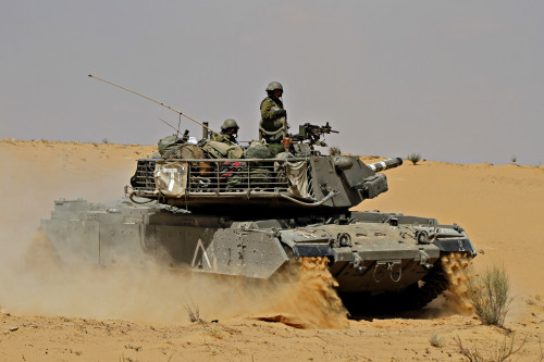 An Israel Defense Force Magach 7 main battle tank during an exercise in the Negev desert, Israel Poster Print - Item # VARPSTZDN100122M