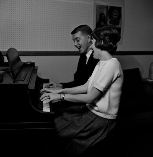 Young couple playing piano and singing Poster Print - Item # VARSAL255421663