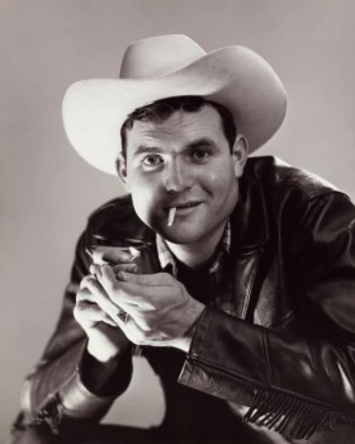 Portrait of a cowboy lighting a cigarette Poster Print