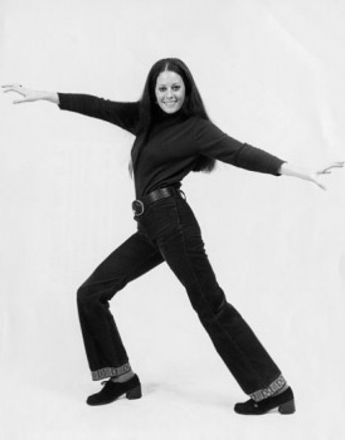 Young woman standing with her arms outstretched and smiling Poster Print - Item # VARSAL2558725