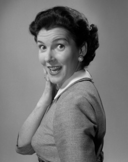 Studio portrait of surprised woman smiling Poster Print - Item # VARSAL25511558