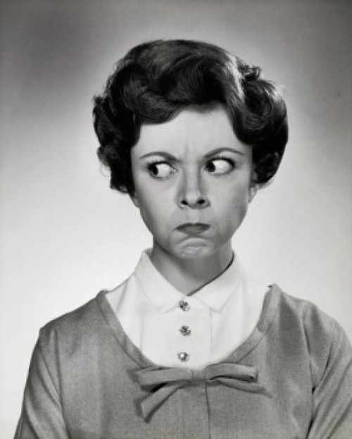 Portrait of young woman making face Poster Print - Item # VARSAL2551103