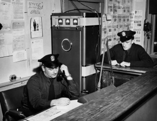 Two policemen working in office Poster Print - Item # VARSAL25533078