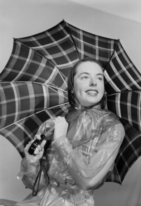 Studio portrait of young woman holding umbrella Poster Print - Item # VARSAL255422995A