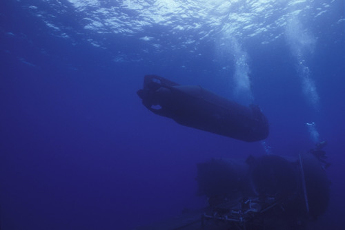 A SEAL Delivery Vehicle approaches the Dry Deck Shelter aboard USS Kamehameha Poster Print - Item # VARPSTWOD100149M
