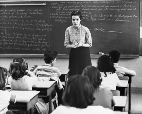 Female teacher teaching students in a classroom Poster Print - Item # VARSAL2552149