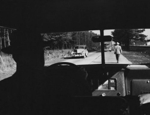 Silhouette of a man driving a car Poster Print