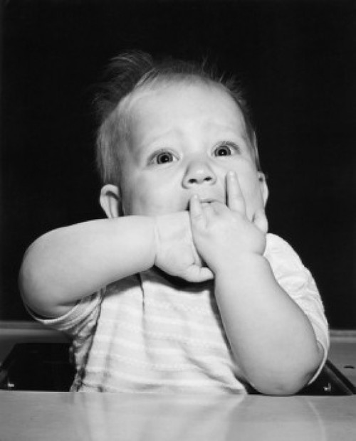 Baby holding palms in mouth  portrait Poster Print - Item # VARSAL2554520C