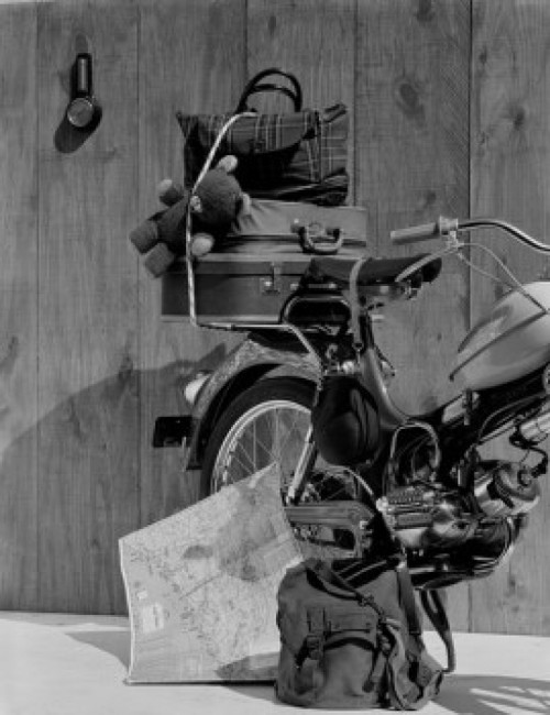 Array of travel items on motorcycle Poster Print